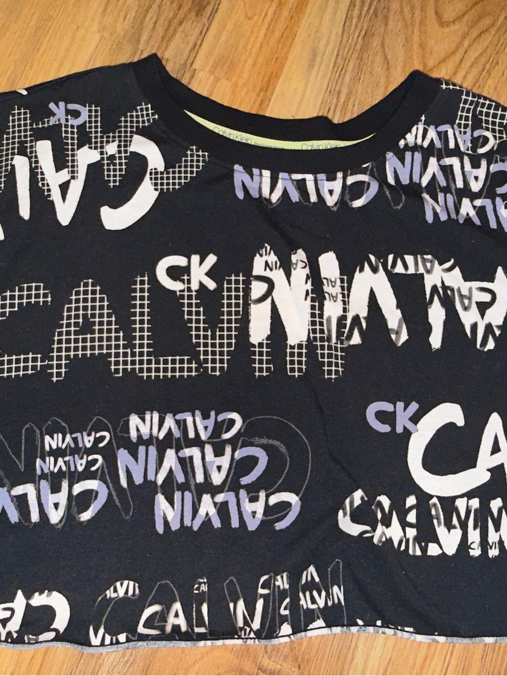 Calvin Klein Black Tee with White and Light Purple Logo Print